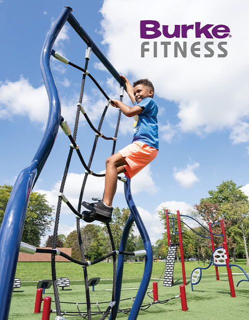 Child climbing on the Burke play equipment rope fitness course