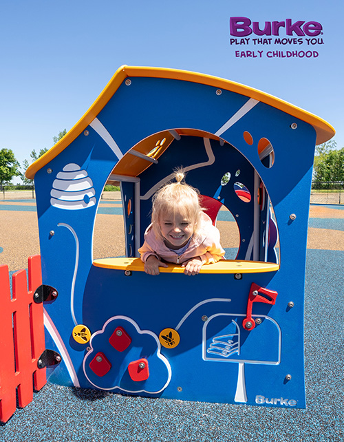Young child playing on Burke playground equipment 